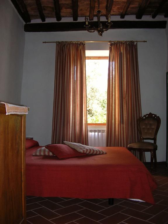Отель Borgo Vecchio Монтальчино Номер фото